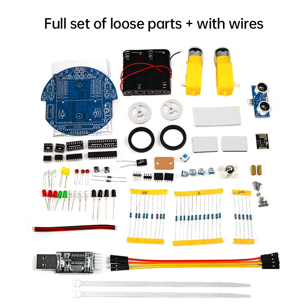 Set of electronic components including boards, sensors, and wires on a white background